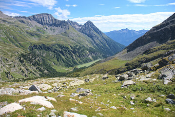 Fototapeta na wymiar Hiking in Mölltaler Glacier area, high mountains, glacier, waterdams and cows on pastures 
