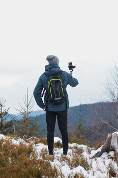 Photographer I Know Uses A Gimbal On His Phone To Get A Better Video Image. Shooting Videos In Winter Czech Nature. Vlogging Live