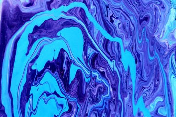 Abstract blue marble background. The lines and waves of acrylic paint create an interesting structure. Background for web design, fabric, design, laptop case.
