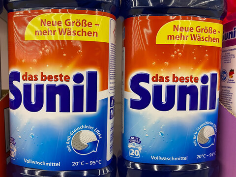 Viersen, Germany - May 9. 2021: Close up of packets Sunil laundry washing detergent in shelf of german supermarket (focus on center of left box)