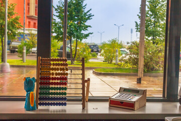 Early Learning Centre, preschool learning center concept. A big window and educational toys on the...