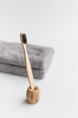 Wooden bamboo toothbrushes on white background