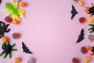 halloween candy on pink background