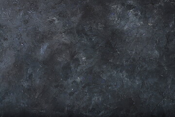 Natural old wall with fresh plaster painted in dark color, texture for photo design, for making photo backdrops, banner for advertisement or invitation, place for text,