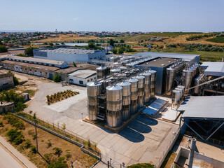 Fototapeta premium Modern winery and vineyard, aerial view from drone
