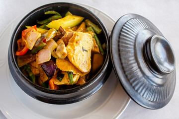 Clay pot of Chinese tofu and vegetable in sauce
