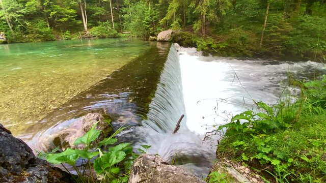 Source of the river and small waterfalls in beautiful nature environment