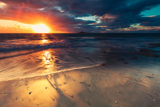 Greek Seascape - Colorful sunset on the beach