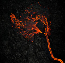 Flow of lava on rocky ground