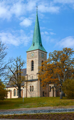 Gustavsberg. Stone church against the blue sky