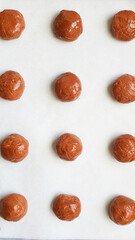 Round chocolate cookie dough before baking pattern flat lay