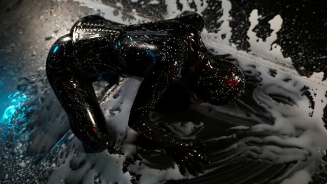 bdsm role playing, submission and domination, woman in latex suit is sitting in white paddle