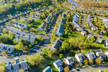 Aerial view of residential houses neighborhood complex at suburban housing development