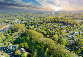 The residential quarters of sunset dawn over the village near