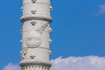 USA, Virginia, Yorktown - March 30, 2013: Yorktown Victory Monument, halfway up the white stone...