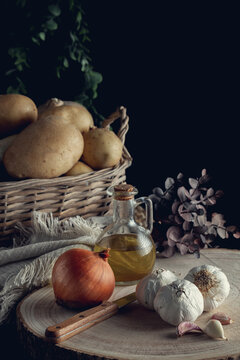 Potato basket on black background in vertical