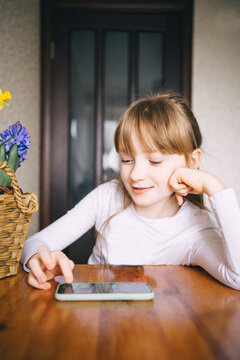 girl learning to count on abacus
