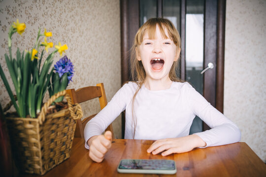 girl learning to count on abacus
