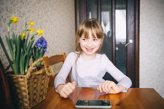 girl learning to count on abacus