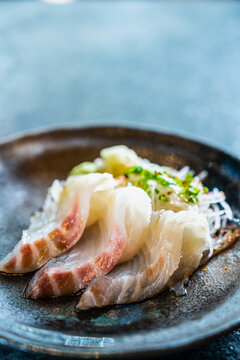 Madai or Sea bream sashimi at sushi bar in Northern Thailand