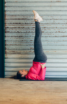 49 year old woman doing yoga exercises