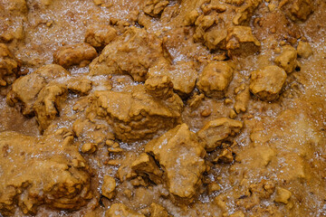 Sand covered with ice after freezing rain