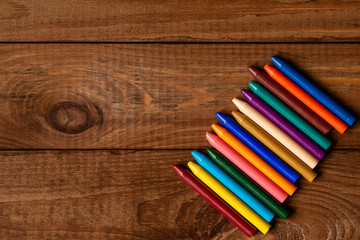 Set of wax crayons in a row for drawing.