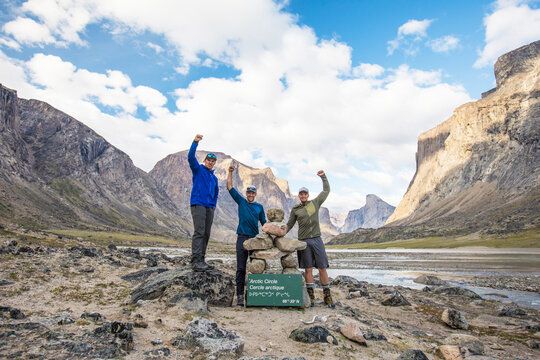 Three mountaineers pose for picture at the Arctic Circle Akshayuk Pass