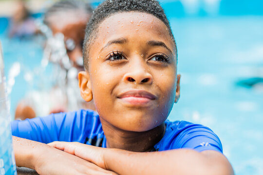 Portrait of an African American boy in pool