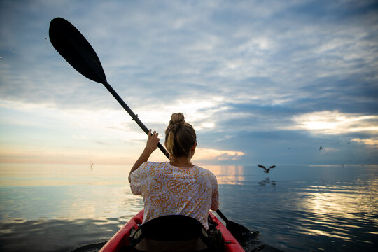 Female kayaking at Smith Island in Maryland.
