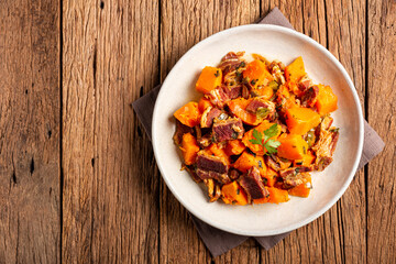 Dried meat with pumpkin. Tipical brazilian dish.