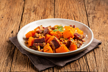 Dried meat with pumpkin. Tipical brazilian dish.