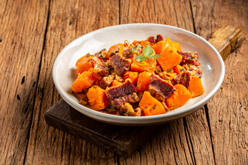 Dried meat with pumpkin. Tipical brazilian dish.