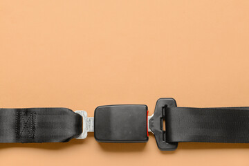 Car seat belt on color background