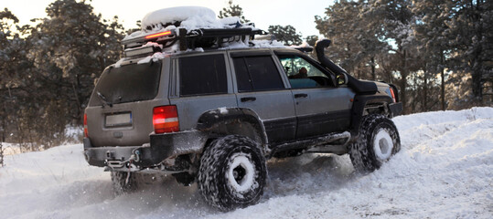 One SUV 4x4 cars go on snowy road, winter season © serdarerenlere