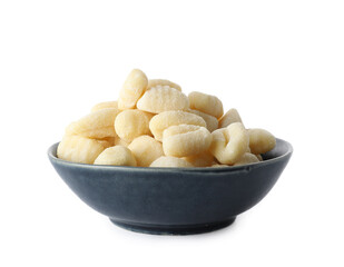 Bowl with raw gnocchi on white background
