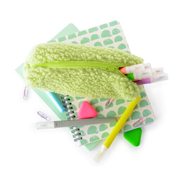 Pencil case and stationery supplies on white background
