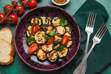 Composition with tasty grilled zucchini on color background