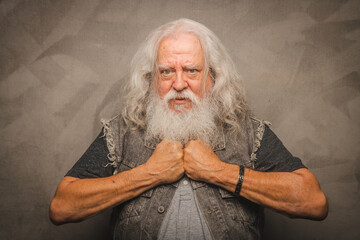 Grizzled Old Rogue with Long Gray Hair and White Beard Clowns for the Camera