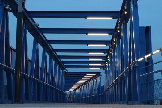 Low Angle View Of Illuminated Bridge Against Sky