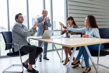 Businesspeople discussing together in the conference room during meeting at the office.