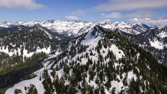 Drone Hyperlapse Over Snowy Ridge in Cascade Mountain Range