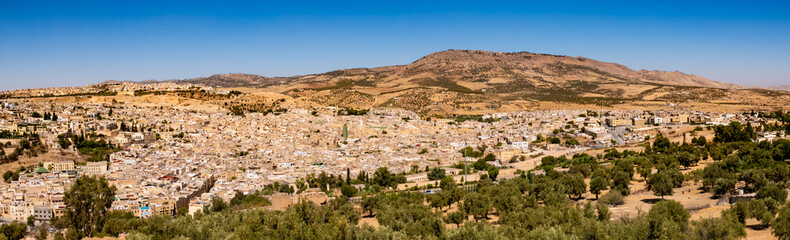 Fototapeta na wymiar Desert mountains city landscape