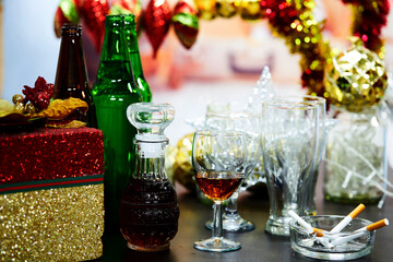 Fototapeta na wymiar beer bottle and glasses of alcohol on table 