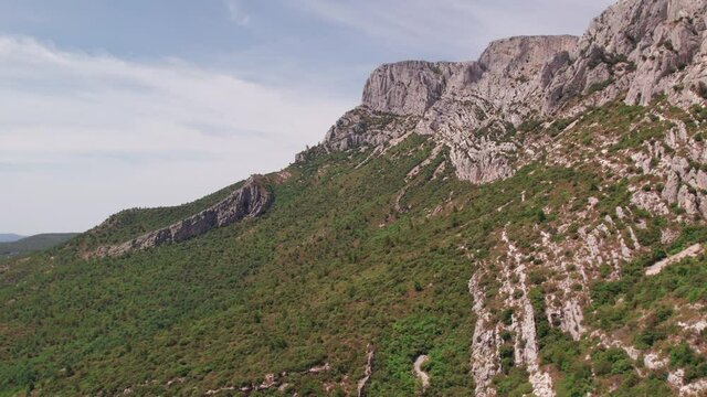 Sainte Victoire limestone mountain southern France, dolly in aerial shot