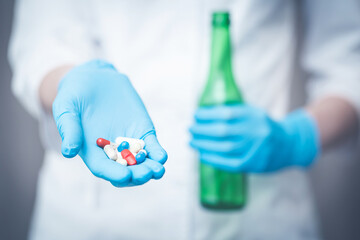 alcohol addiction treatment concept. the doctor prescribes pills for alcohol addiction.