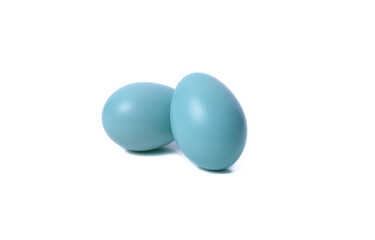 Blue bird eggs on white background
