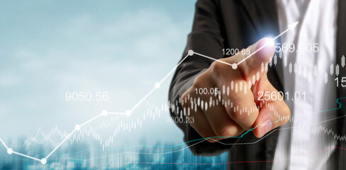 Touching graphs of financial indicator and accounting market economy analysis chart