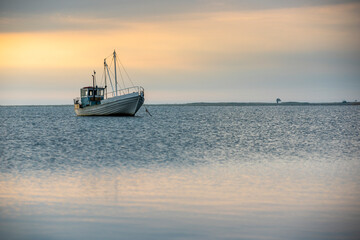 fishing boat on the sea at sunset, sunset by the sea with boat