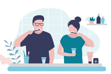 Couple brushing teeth in bathroom. Man and woman practice oral hygiene. Girl and guy do morning routine together